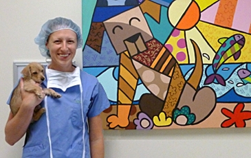 Dr. Hutsell with a pup