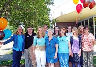 An outdoor group photo of ASAP's leadership committee including the Executive Directors of the member organizations